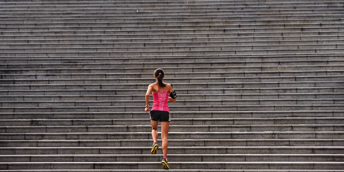 WOMAN RUNNING STAIRS