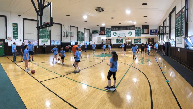 High school students and supervising adults work with young adults with autism at St. Joseph's Church in Maplewood NJ