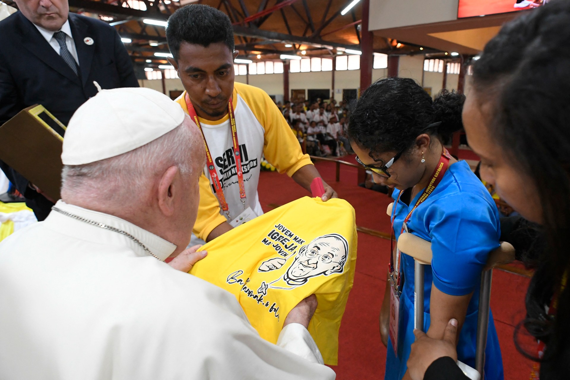 Pope Francis (L) meeting with young people at the Centro de Convercoies in Dili.