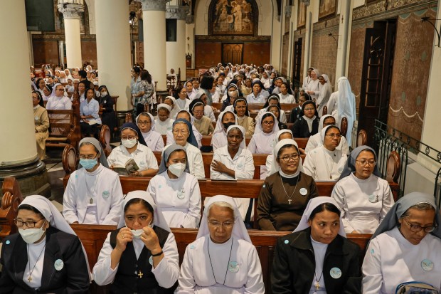 Nuns wait for the arrival of Pope Francis at the Jakarta Cathedral in Jakarta on September 4, 2024